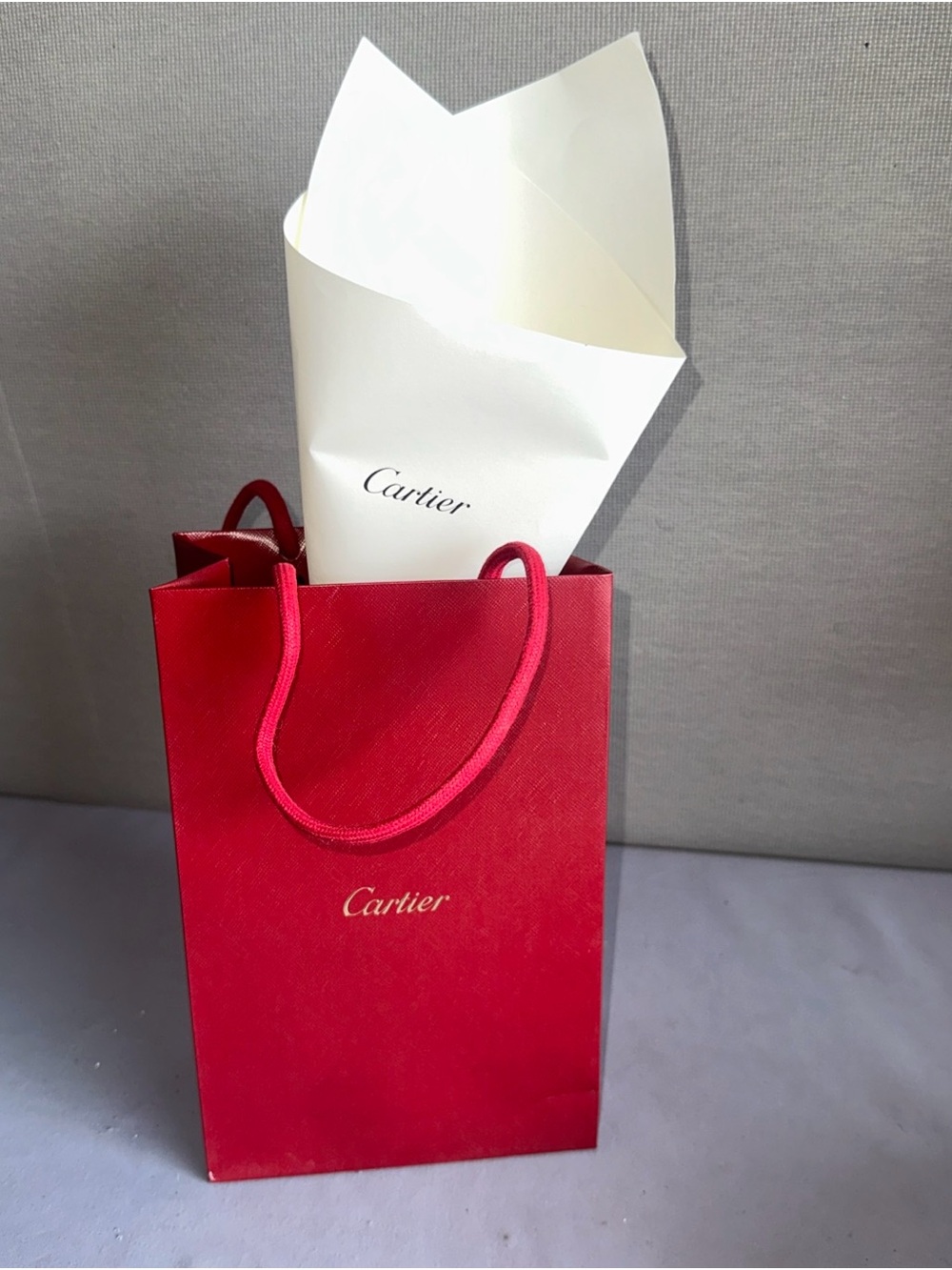 Cartier Red Mini Shopping Bag with Rope Handles. 10”X6.5”X 3.5”